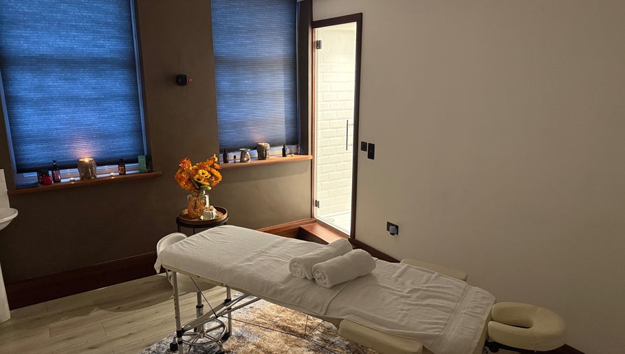 Cozy massage room with soft lighting at Elysium Massage Abergavenny, Abergavenny, Wales, GB.