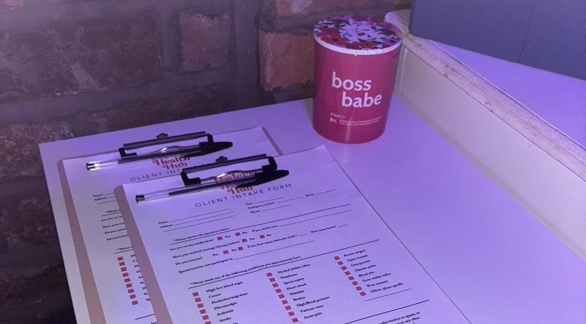 Client intake forms at Hayley's Health Hub in Knowsley, England, GB, ready for new visitors.