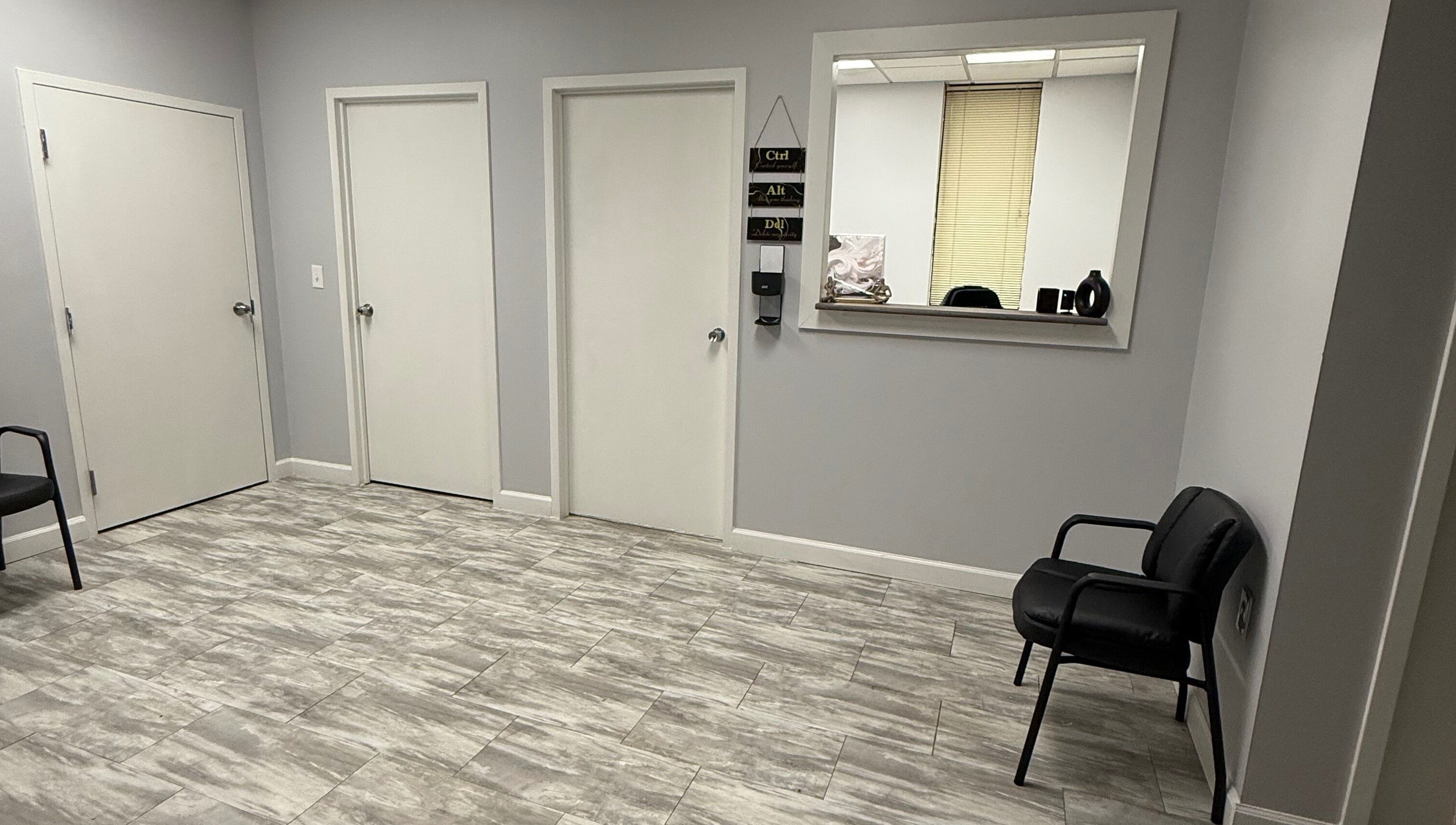WETPARLOR's sleek reception area in Lanham, Maryland, US, featuring modern decor and comfortable seating.