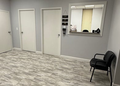 WETPARLOR's sleek reception area in Lanham, Maryland, US, featuring modern decor and comfortable seating.