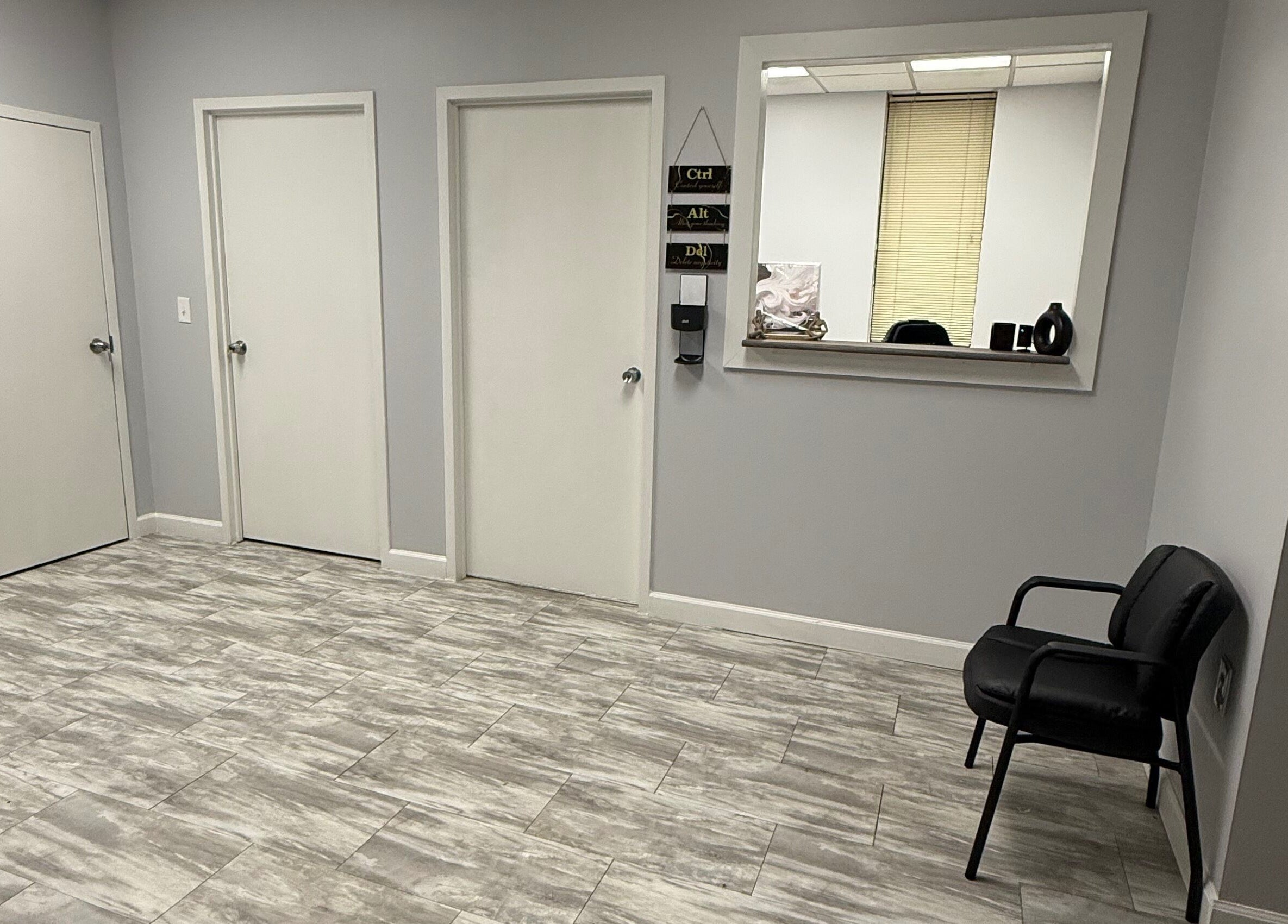 WETPARLOR's sleek reception area in Lanham, Maryland, US, featuring modern decor and comfortable seating.