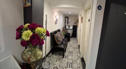Charming hallway with floral decor at Facial & Body Contour by Zora, London, England, GB.