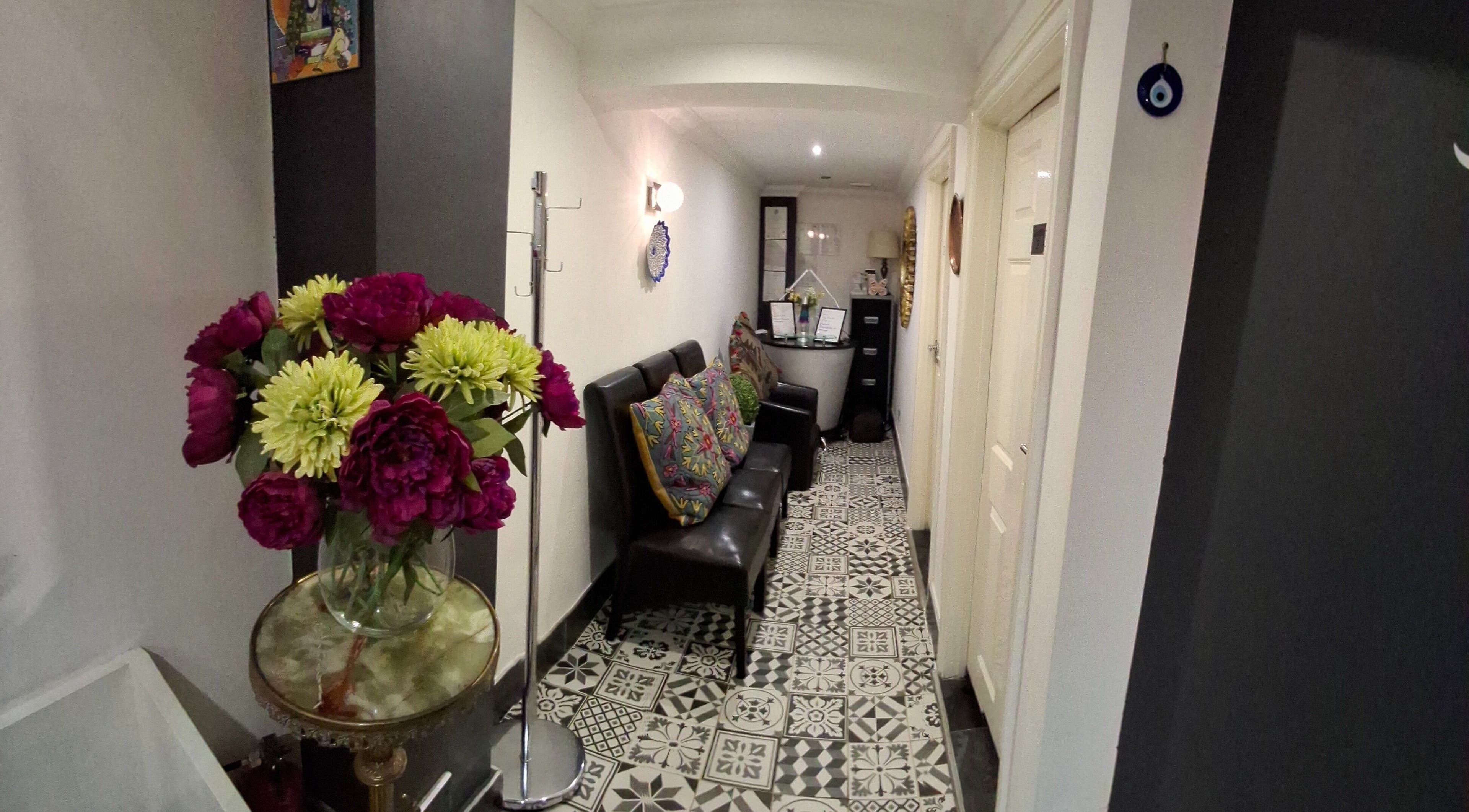 Charming hallway with floral decor at Facial & Body Contour by Zora, London, England, GB.