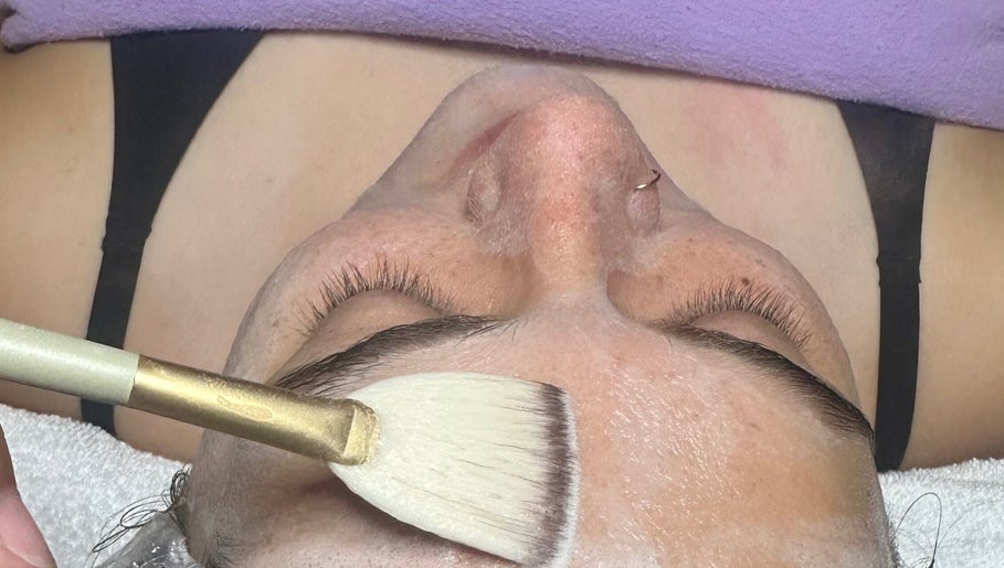Facial treatment with brush at Beautifully Layered Skin, Kernersville, North Carolina, US.