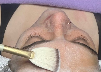 Facial treatment with brush at Beautifully Layered Skin, Kernersville, North Carolina, US.
