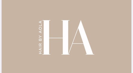 Elegant logo of Hair by Aola, a chic salon in Tarporley, England, GB.