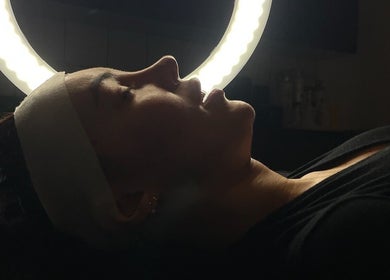 Facial treatment under ring light at Harriet.Alice.Beauty, Alford, England, GB.