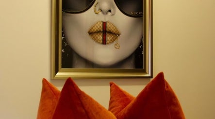 Stylish art decor with vibrant cushions at Beauty By Aimee, Dundee, Scotland, GB. Elegance meets creativity.