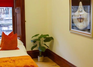 Relaxing treatment room at Beauty By Aimee, Dundee, Scotland, GB, featuring cozy decor and calming ambiance.