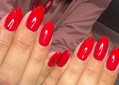 Vibrant red nails at LAnails & beauty, Linlithgow, Scotland, GB, showcasing expert nail artistry.