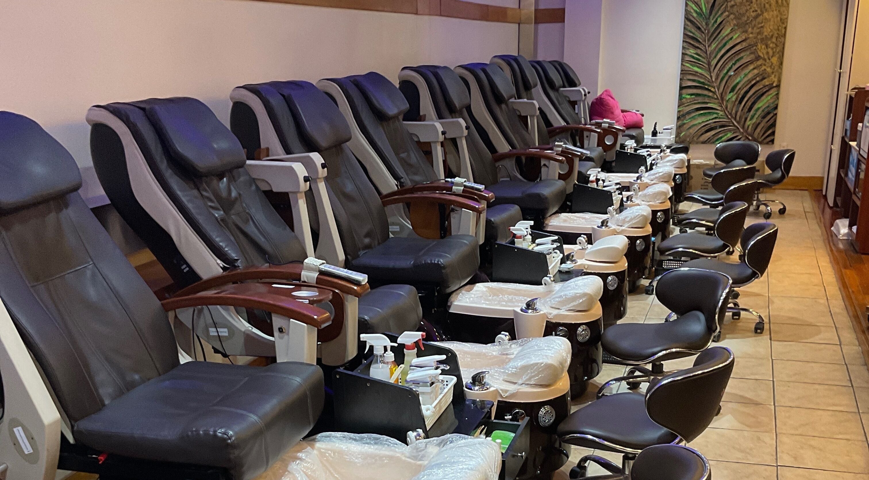 Luxurious pedicure chairs at Nail Place 4U, New York, New York, US, offering a relaxing spa experience.