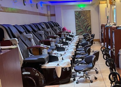 Elegant pedicure chairs at Nail Place 4U, New York, New York, US, showcasing a relaxing spa atmosphere.