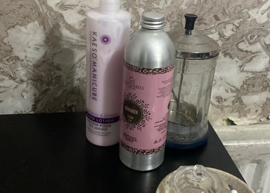 Nail Kouture beauty products displayed on a black surface in Wolverhampton, England, GB.