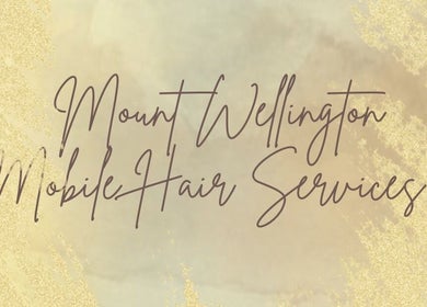 Elegant script of Mount Wellington Mobile Hair Services in Auckland, Auckland, NZ on a golden background.
