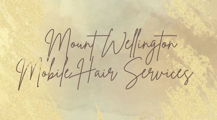 Elegant script of Mount Wellington Mobile Hair Services in Auckland, Auckland, NZ on a golden background.