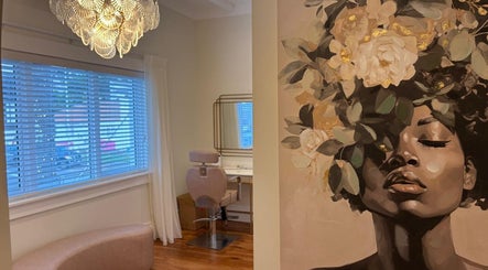 Elegant beauty chair and floral art at Embreis Beauty, Auckland, NZ.