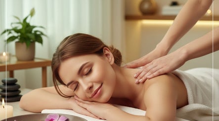 Woman enjoying a massage at Esha Massage for Women, Bengaluru, Karnataka, IN.