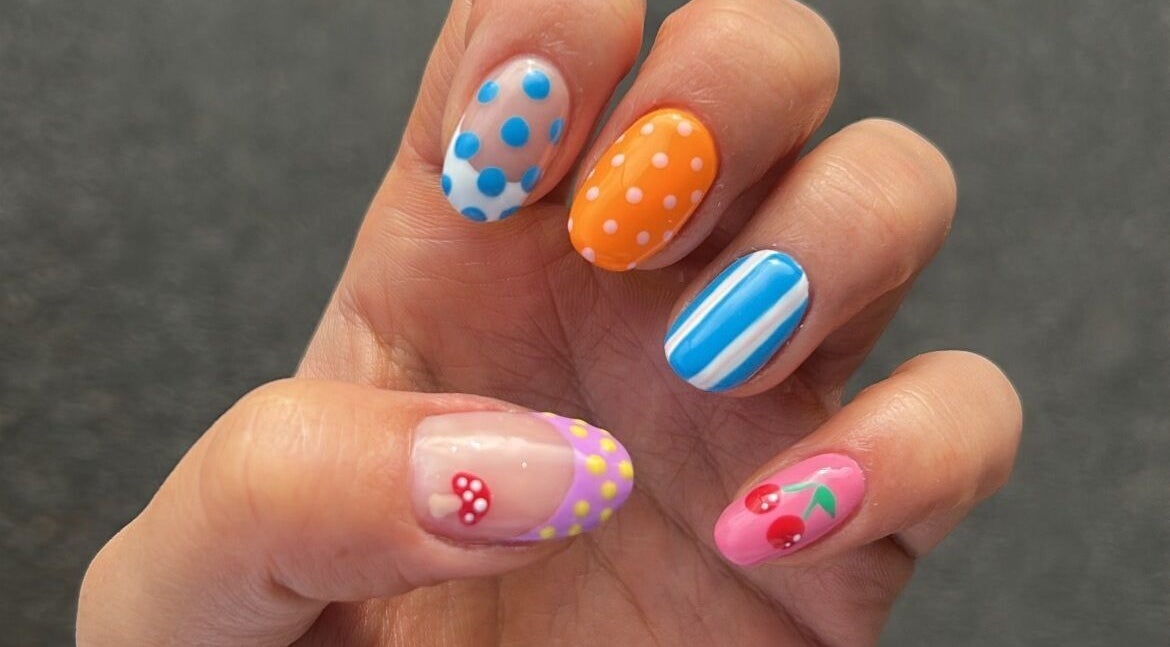 Vibrant polka dot and cherry nail art at Gym Bunny Nails in Auckland, Auckland, NZ.