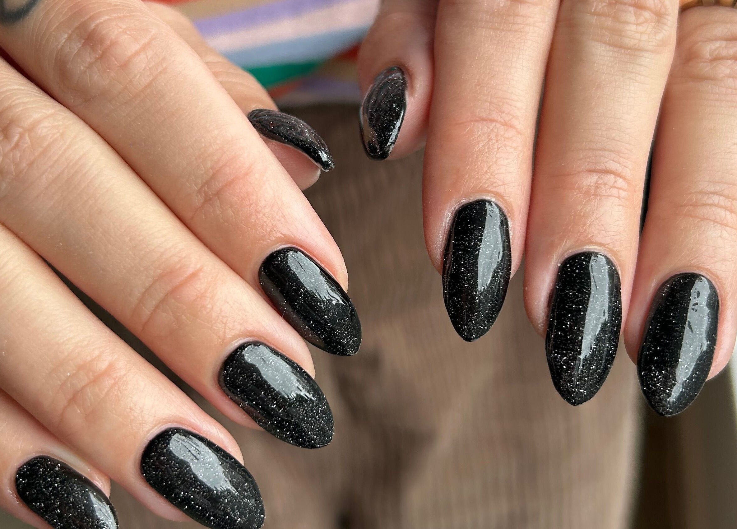 Elegant black glitter nails designed at Gym Bunny Nails, Auckland, Auckland, NZ.