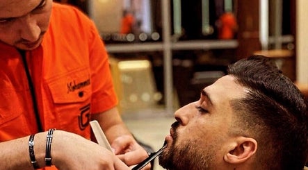 Expert barber providing grooming services at Mohamad maamari, Salmiya, KW.