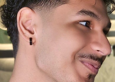 Close-up of a man with neatly trimmed facial hair at Mohamad maamari in Salmiya, KW.