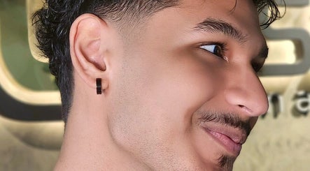 Close-up of a man with neatly trimmed facial hair at Mohamad maamari in Salmiya, KW.