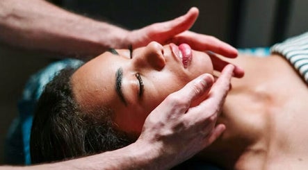 Relaxing facial massage at FACIAL REBOOT, Milano, Lombardia, IT. Experience ultimate rejuvenation.