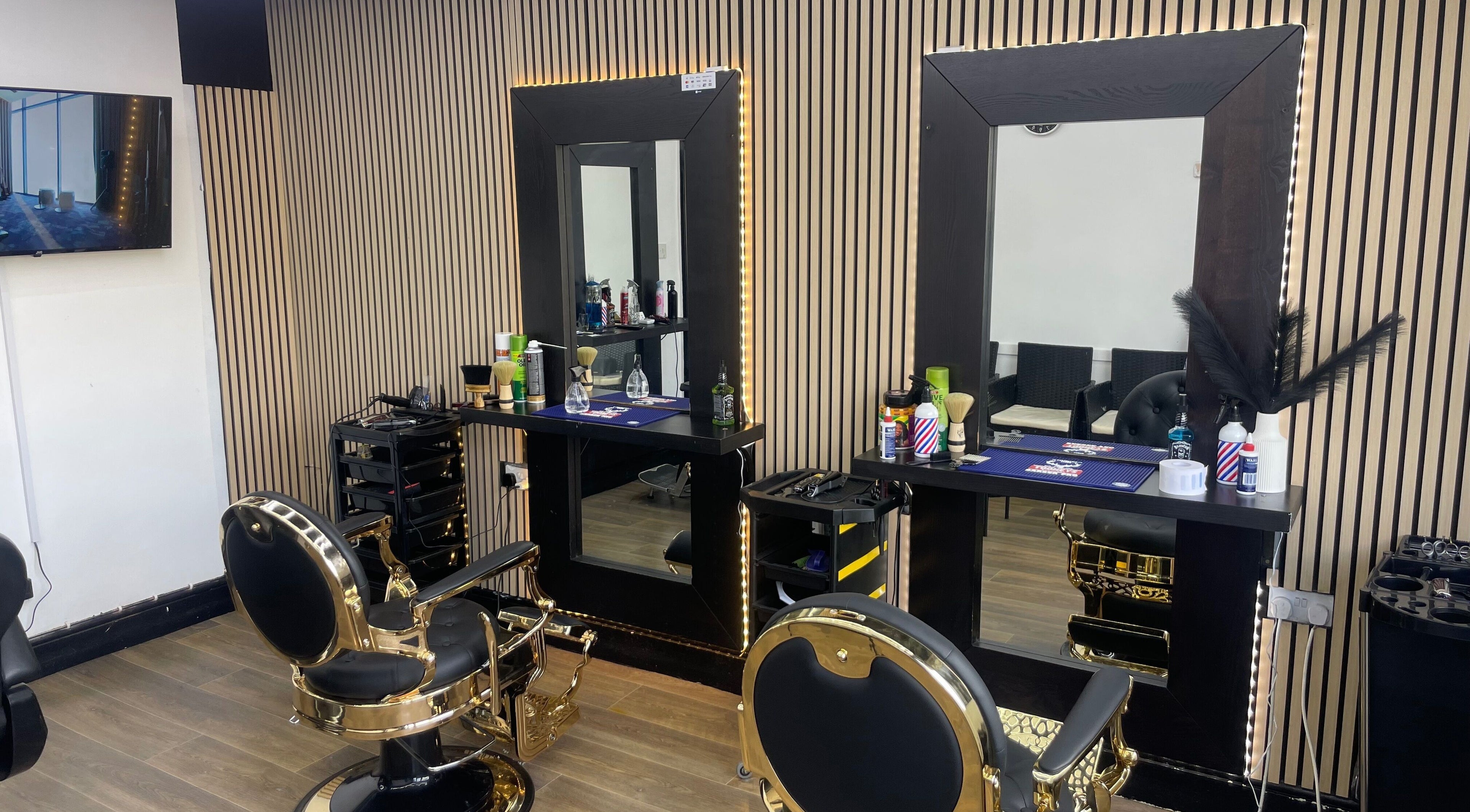 Rich and Beauty Lounge salon chairs and mirrors in Leeds, England, GB, showcasing modern elegance.