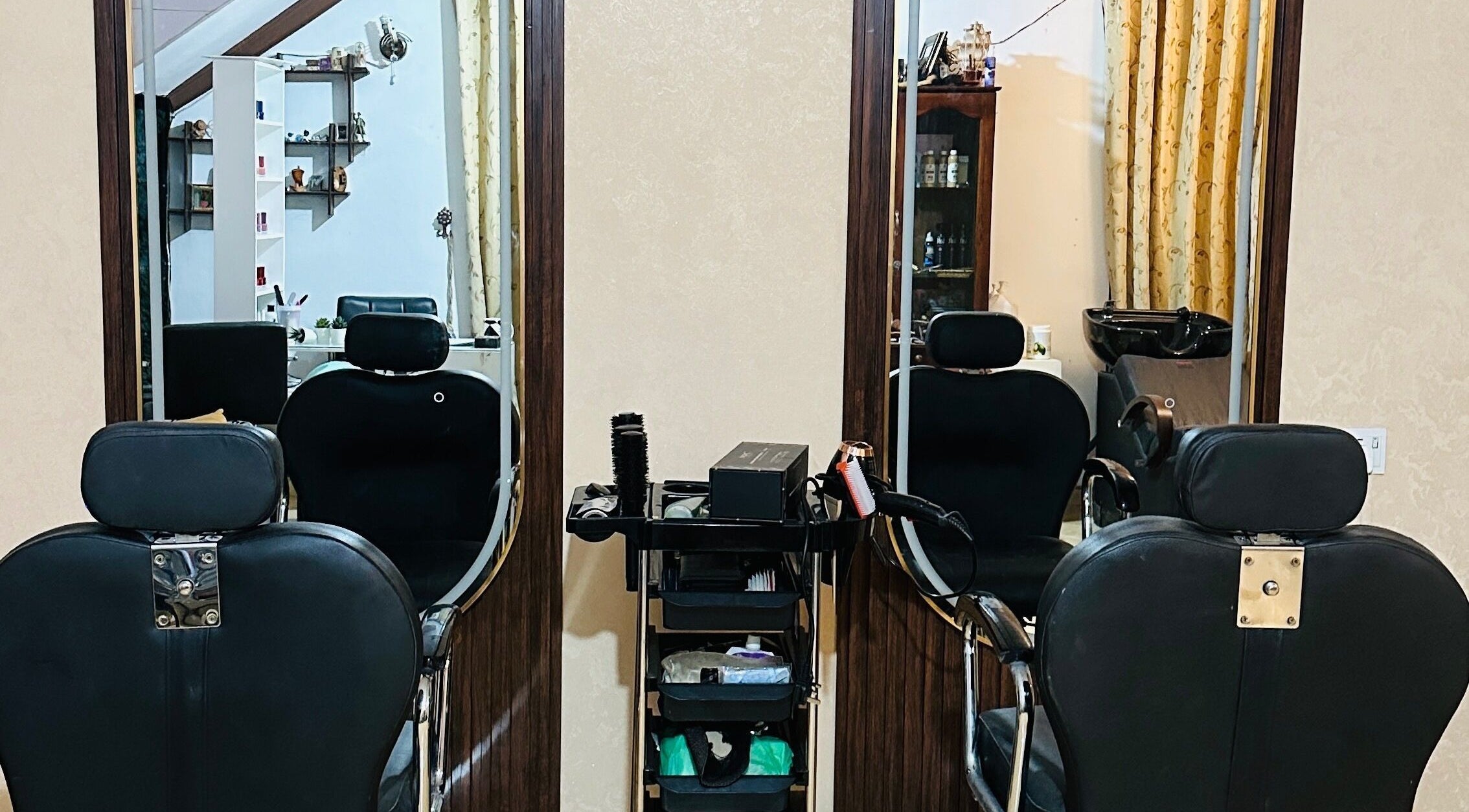 Modern salon chairs at Inakshi Mendis Salons, Negombo, Western Province, LK, offer a luxurious styling experience.