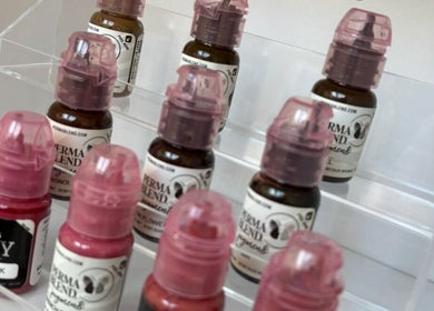 Colorful pigment bottles on display at EmpowerHer Beauty, Edinburgh, Scotland, GB.