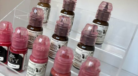 Colorful pigment bottles on display at EmpowerHer Beauty, Edinburgh, Scotland, GB.
