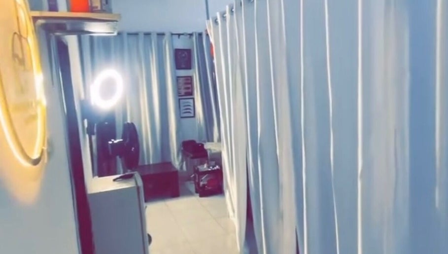 Bright, tranquil room at Everythingblessing Xaesthetic, Lekki, Lagos, NG, featuring elegant curtains and relaxing decor.