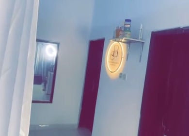 Entrance view of Everythingblessing Xaesthetic with soft lighting in Lekki, Lagos, NG.