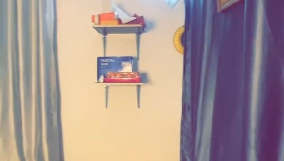 Shelves with wellness products at Everythingblessing Xaesthetic, Lekki, Lagos, NG. Ambiance with soothing curtains.