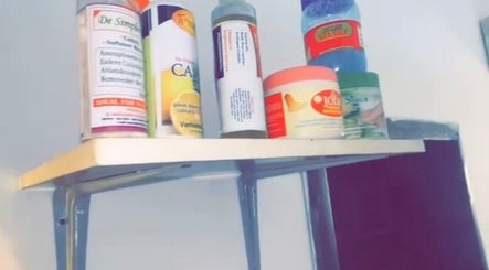 Beauty products on a shelf at Everythingblessing Xaesthetic, Lekki, Lagos, NG.