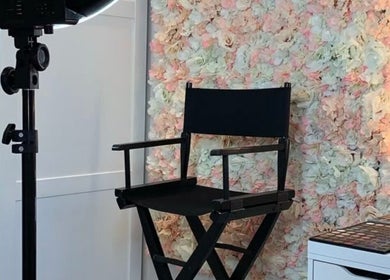 Makeup chair in floral-themed studio at Everythingblessing Xaesthetic, Lekki, Lagos, NG, for beauty treatments.