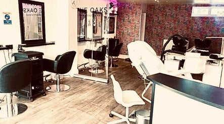 Modern salon chairs and mirrors at Izzywood.hair, Stoke-on-Trent, England, GB, offering chic styling services.
