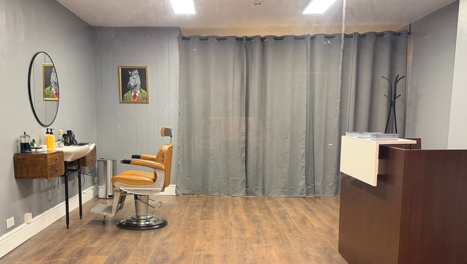 Elegant interior of Sina Grooming Atelier with styling chair in Winchester, England, GB.