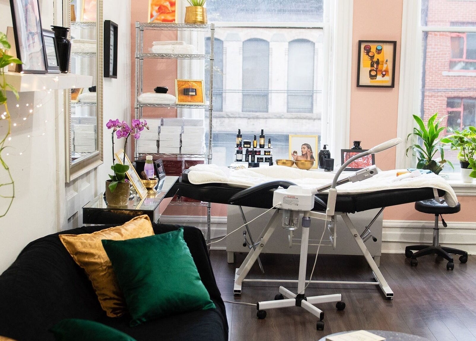 Spacious beauty room at Maison OKOKO in Vancouver, British Columbia, CA, featuring elegant decor and cozy seating.