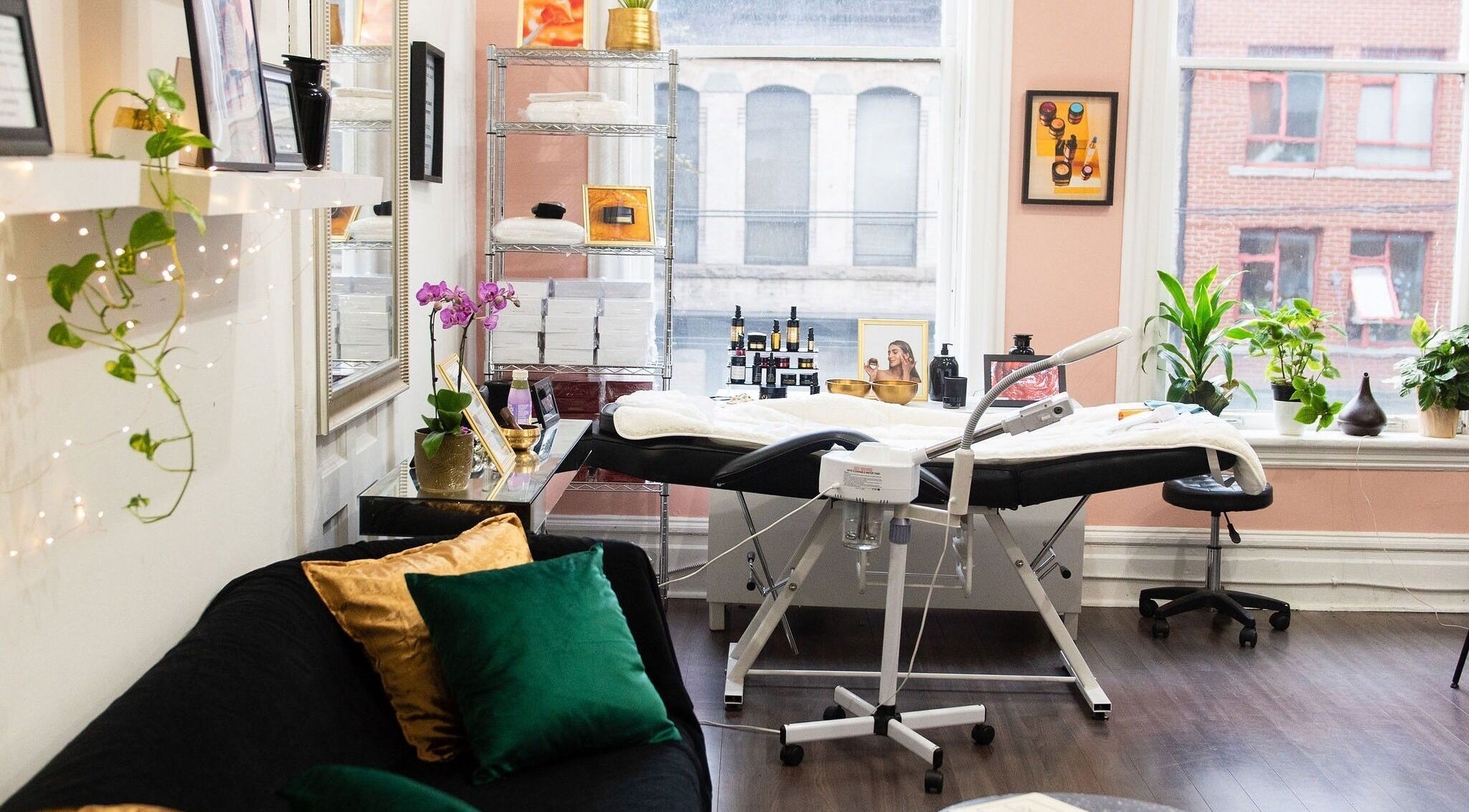 Spacious beauty room at Maison OKOKO in Vancouver, British Columbia, CA, featuring elegant decor and cozy seating.