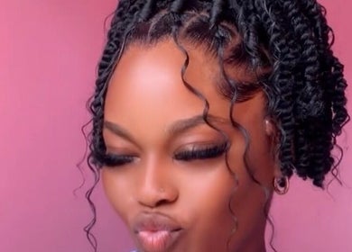 Chic twist hairstyle at Shearsblessinghairsalon in Bridgetown, Saint Michael, BB. Perfect for modern looks.