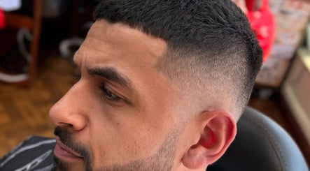 Close-up of a stylish fade haircut at Andi.hair.hustler, Birkenhead, England, GB, showcasing precise detailing.