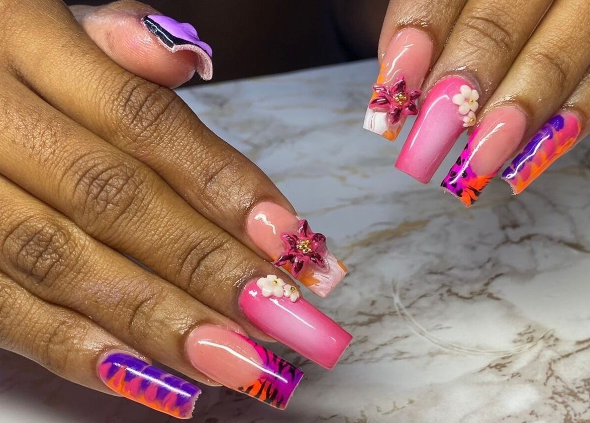 Colorful nail art at Ccallicosmetics in Speightstown, Saint Peter, BB, showcasing intricate designs and decorations.