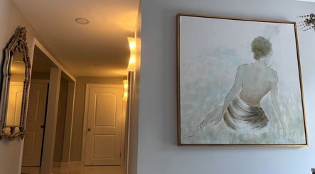 Elegant hallway with artistic painting at No.1 Nassau Spa, Syosset, New York, US.