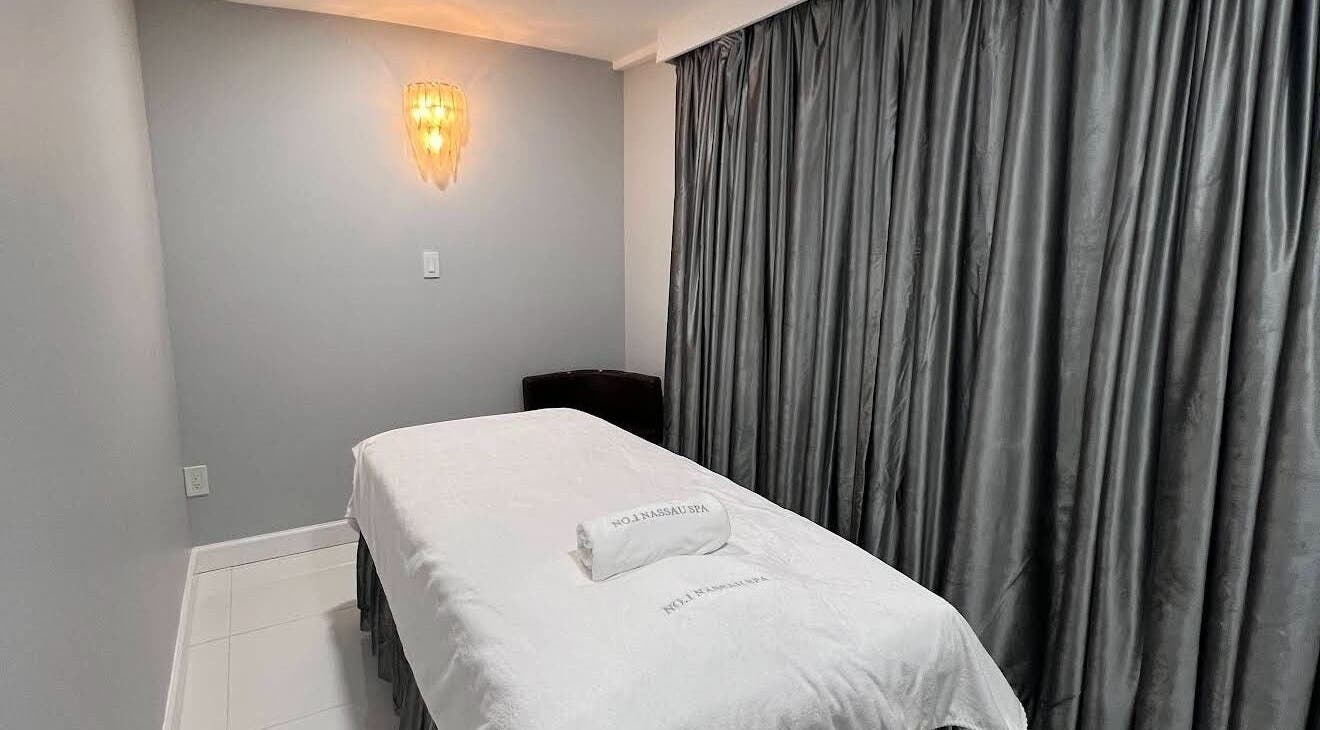 Massage room at No.1 Nassau Spa, Syosset, New York, US offers a serene setting for relaxation.