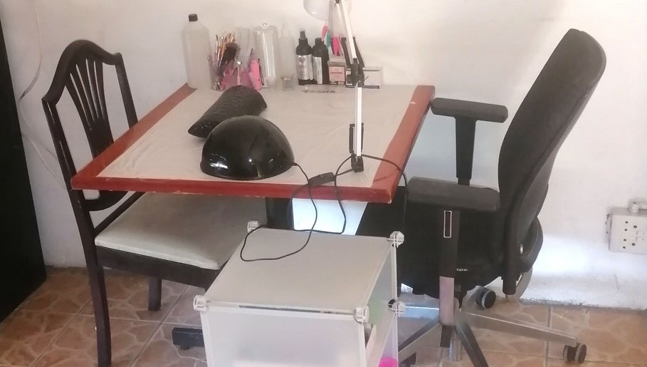 Cozy nail station at Qadi's Nail Lounge in Cape Town, Western Cape, ZA, showcasing a stylish setup.