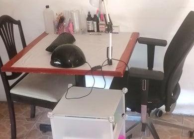 Cozy nail station at Qadi's Nail Lounge in Cape Town, Western Cape, ZA, showcasing a stylish setup.