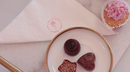 Delightful chocolates and a cupcake at Glow Up Beauty Studio in Dublin, County Dublin, IE.