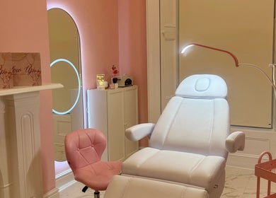 Elegant beauty treatment room at Glow Up Beauty Studio in Dublin, County Dublin, IE, featuring a plush chair.