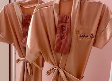 Elegant silk robes at Glow Up Beauty Studio, Dublin, County Dublin, IE, creating a luxurious atmosphere.